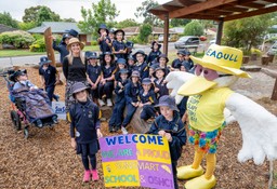 A group of Surrey Downs Primary School students with Kerry Rowlands and Sid the Seagull