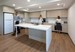 3 people using a shared kitchen